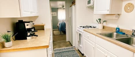 Fridge, microwave, oven, dining tables