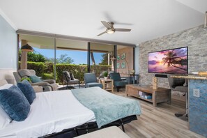 Apartamento família, 1 cama King e sofá-cama, vista para o jardim (1 BR 1011) | Área de estar