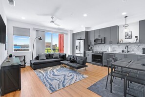 Curl up in the chic living room & stream all your favorite entertainment