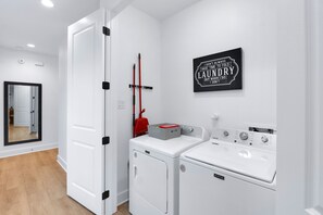 Private laundry is available for your stay, tucked away on the first floor