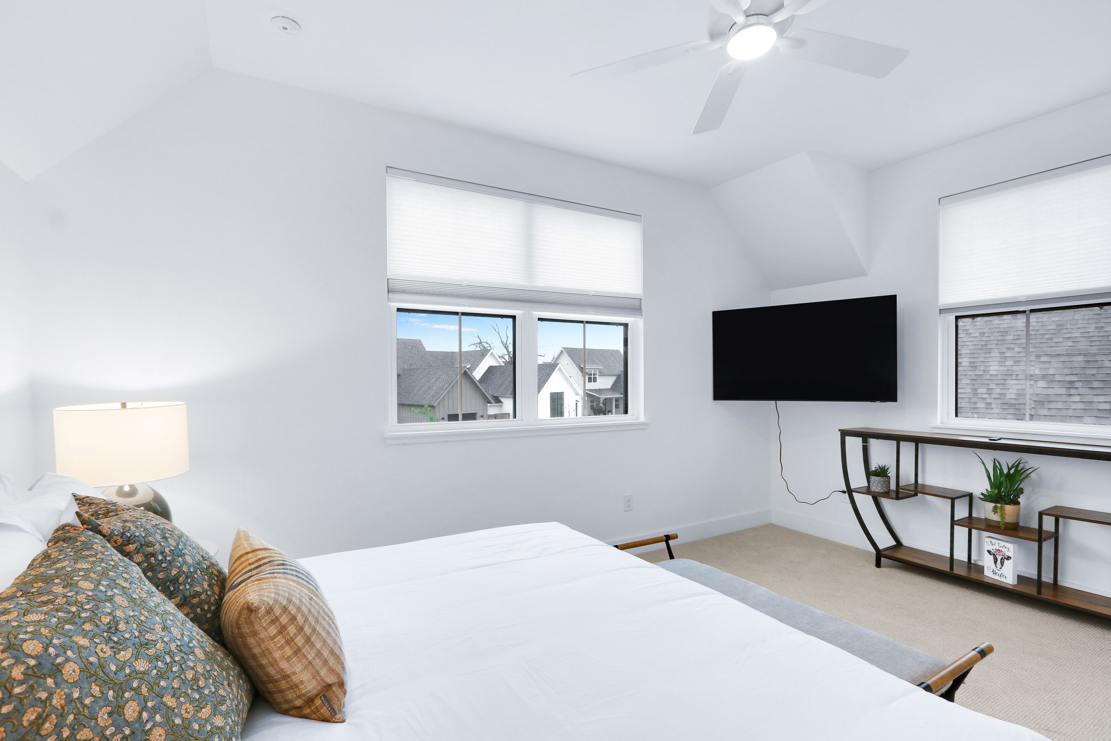A plush king bed, Smart TV, & ensuite await in this serene 2nd-floor suite