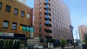 A multi-story hotel with a brick facade and multiple balconies. - Hotel Alpha-One Iwaki (Iwaki)