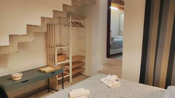 2 bedrooms, desk, iron/ironing board, travel crib