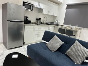Smart TV - Modern vacation apartment with gym, jacuzzi, rooftop pool and sauna. (Playa del Carmen)