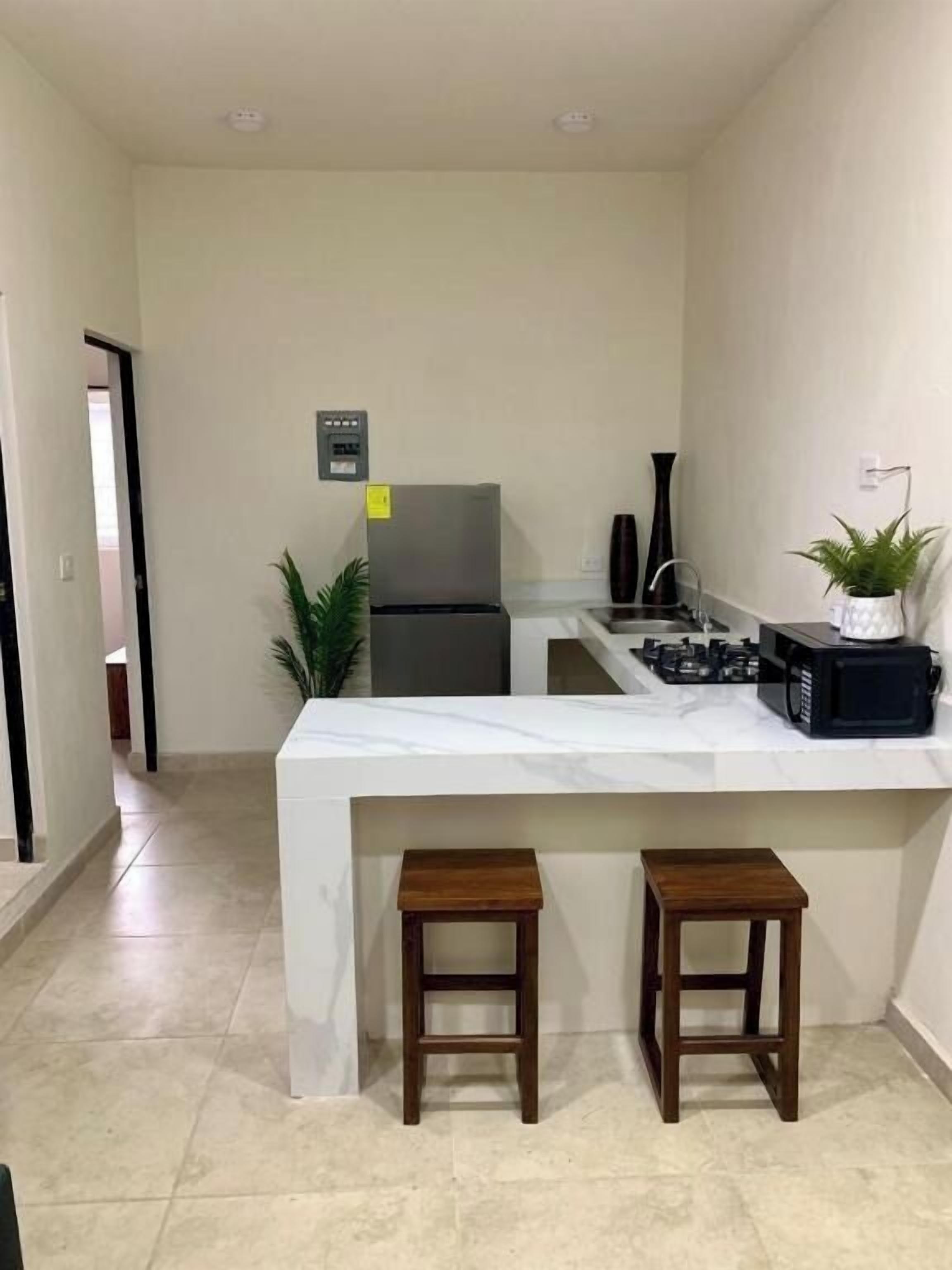 Habitación familiar, 2 habitaciones | Cocina privada | Frigorífico, microondas y placa de cocina