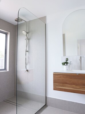 Shower, hair dryer, towels, soap