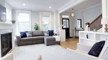 TV, fireplace, books, offices