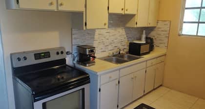 Charming family friendly home,furnished with parking facilities,near malls/beach