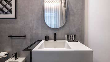 Signature Studio | Bathroom | Shower, hair dryer, slippers, towels