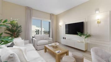 Deluxe Apartment, 1 Bedroom, Balcony, Canal View | Living area