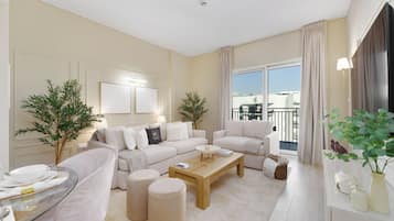 Deluxe Apartment, 1 Bedroom, Balcony, Canal View | Living area