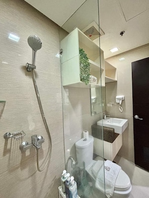 Hair dryer, towels, soap, toilet paper