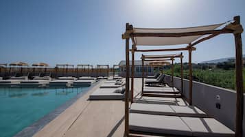 Seasonal outdoor pool, pool umbrellas, sun loungers