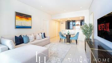 Apartment, Balcony, Canal View | Living area | Flat-screen TV