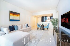 Apartment, Balcony, Canal View | Living area | Flat-screen TV