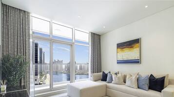 Apartment, Balcony, Canal View | Living area | Flat-screen TV