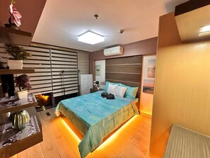 1 bedroom, iron/ironing board, free WiFi, bed sheets - Eastwood Lux Home Away From Home (> 6 month stays, pet friendly, amazing pools) (Quezon City)