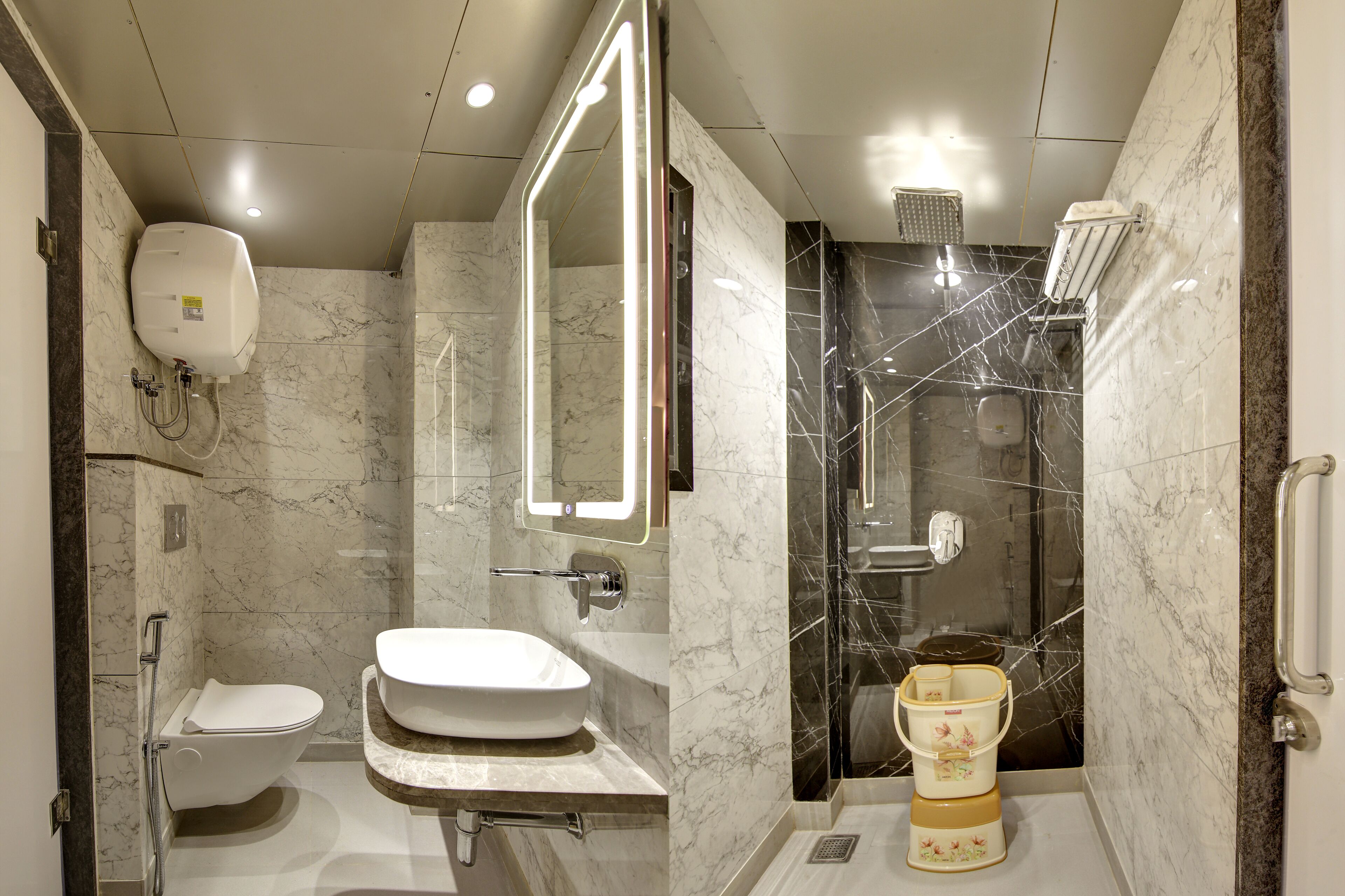 Une salle de bain moderne équipée de toilettes, d’un lavabo et d’une douche.