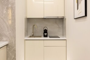 Fridge, coffee/tea maker, electric kettle, toaster