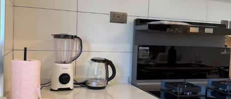 Fridge, microwave, cookware/dishes/utensils