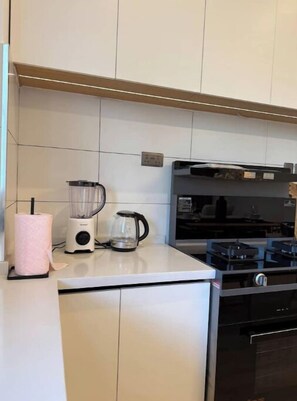 Fridge, microwave, cookware/dishes/utensils