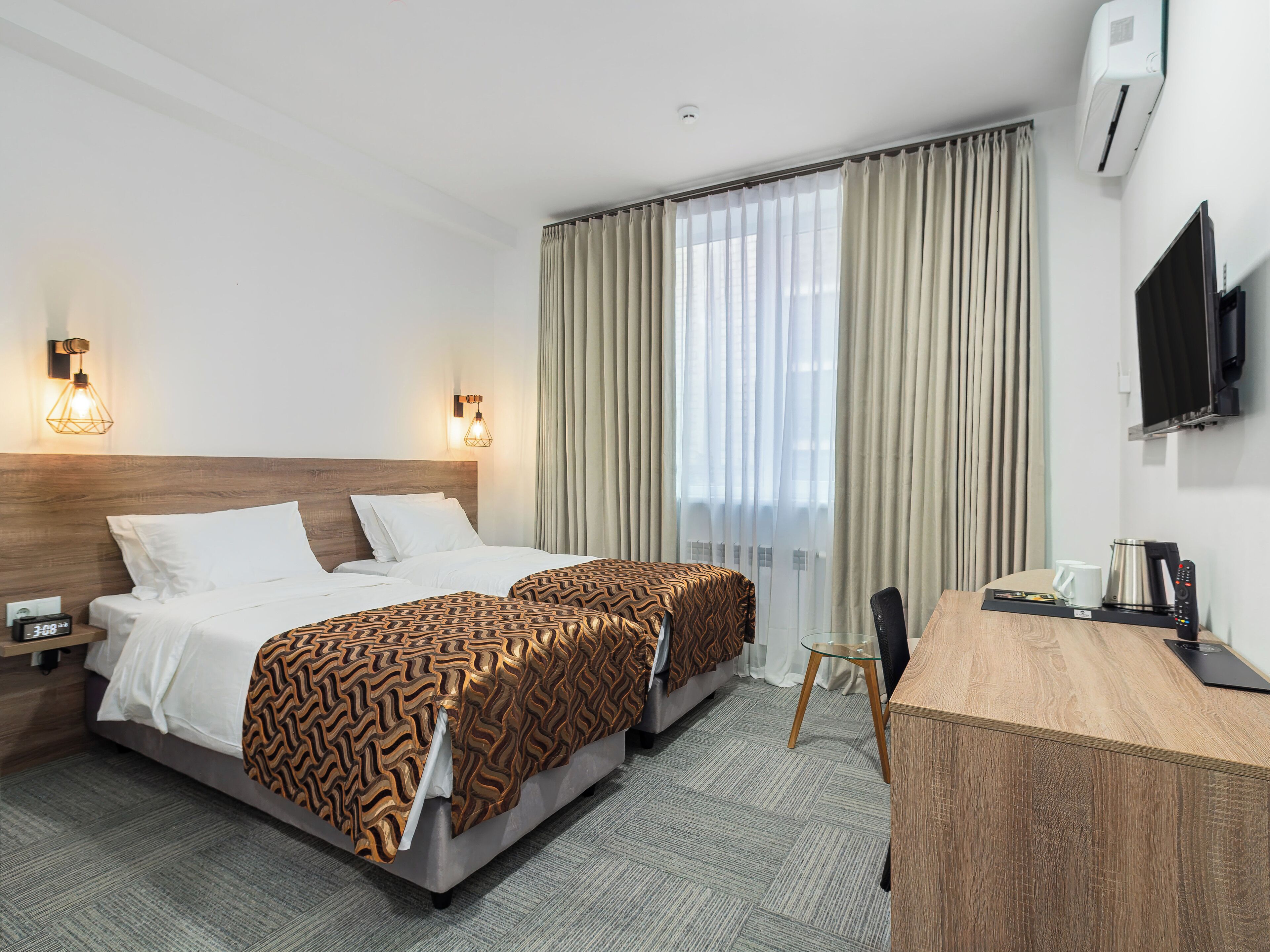 Standard Twin Room, Courtyard View | Hypo-allergenic bedding, memory foam beds, minibar, in-room safe