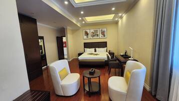 Premium bedding, desk, laptop workspace, soundproofing