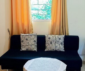 Luxury Apartment, 1 Queen Bed with Sofa bed, Garden View, Ground Floor | Living area | Flat-screen TV