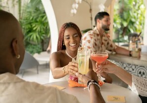 Outdoor dining - At Oceanpark Beach | Saltwater Pool | Bar (San Juan)