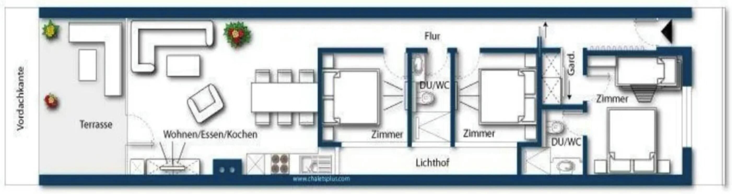 A floor plan with a living area, kitchen, dining room, two bedrooms, a bathroom, and a toilet.