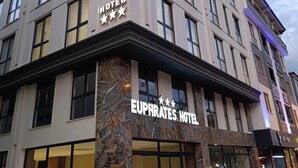 A multi-story hotel with a prominent sign reading "EUPHRATES HOTEL" and three stars. - EUPHRATES HOTEL (Bursa)