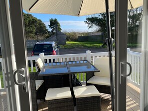 Apartamento | Restaurante al aire libre