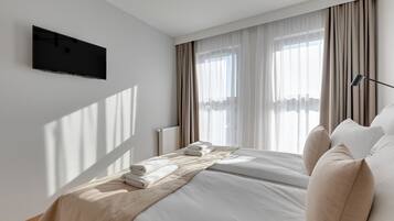 1 habitación, ropa de cama hipoalergénica y decoración personalizada