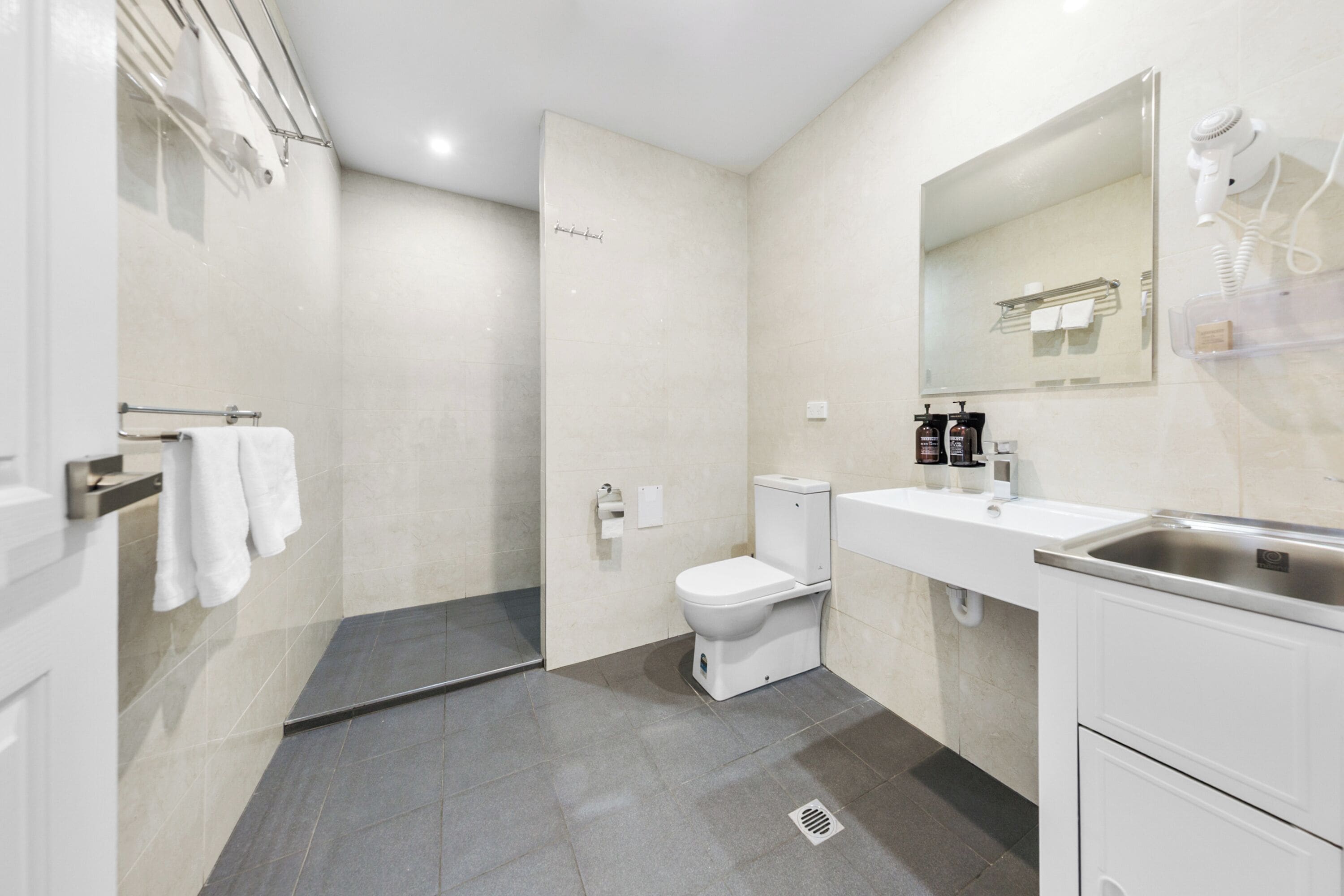 Hair dryer, towels, soap, shampoo