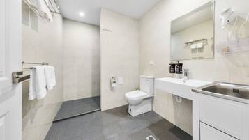 Hair dryer, towels, soap, shampoo