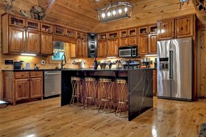 Fridge, microwave, oven, stovetop - Pet-friendly, family-sized cabin rental that is private and sits on a large creek (Blue Ridge)