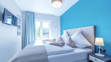 2 dormitorios, tabla de planchar con plancha, wifi gratis y ropa de cama