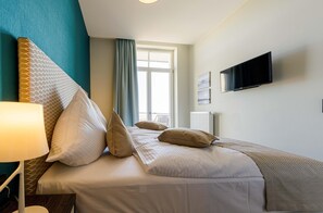 1 dormitorio, tabla de planchar con plancha, Internet y ropa de cama