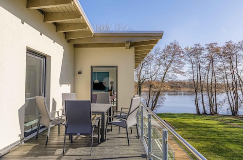 Moderne 5 Sterne Ferienwohnung mit groĂer Dachterrasse und Seeblick