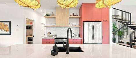 Coffee/tea maker, fridge, microwave, oven