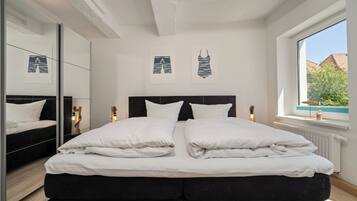 2 dormitoris i roba de llit