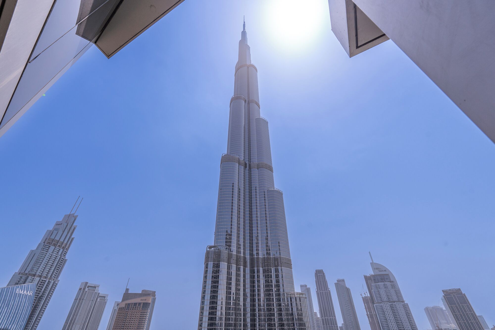 The Burj Khalifa with a clear view of its spire and surrounding skyscrapers.