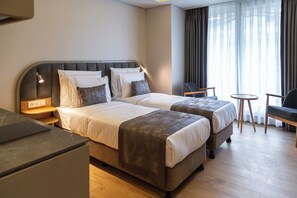 Deluxe Apartment, 1 Bedroom, Balcony, City View | 2 bedrooms, Egyptian cotton sheets, premium bedding, in-room safe