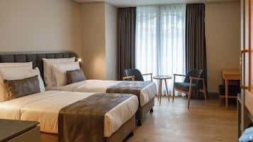 Egyptian cotton sheets, premium bedding, in-room safe, desk