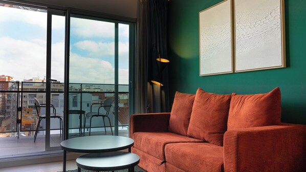 Suite, Terrace | Living area | 32-inch flat-screen TV with digital channels