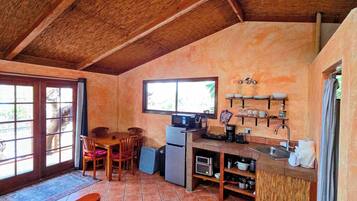 Microwave, coffee/tea maker, toaster, cookware/dishes/utensils