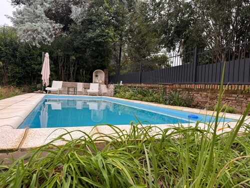 Enjoy a beautiful garden and a refreshing pool with wiring for everyone's safety