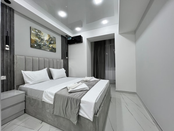 1 chambre, fer et planche à repasser, Wi-Fi, literie fournie