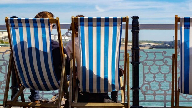 Three striped beach chairs with a railing in the background. - Host Stay Sea View on Manchester Road (Brighton)