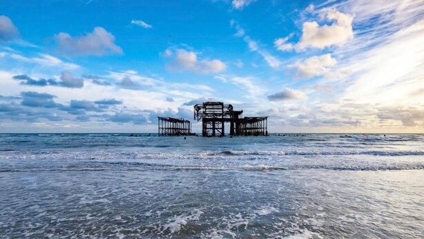 A pier structure extending into the ocean with a clear sky above. - Host Stay Alexandra Villas (Brighton)